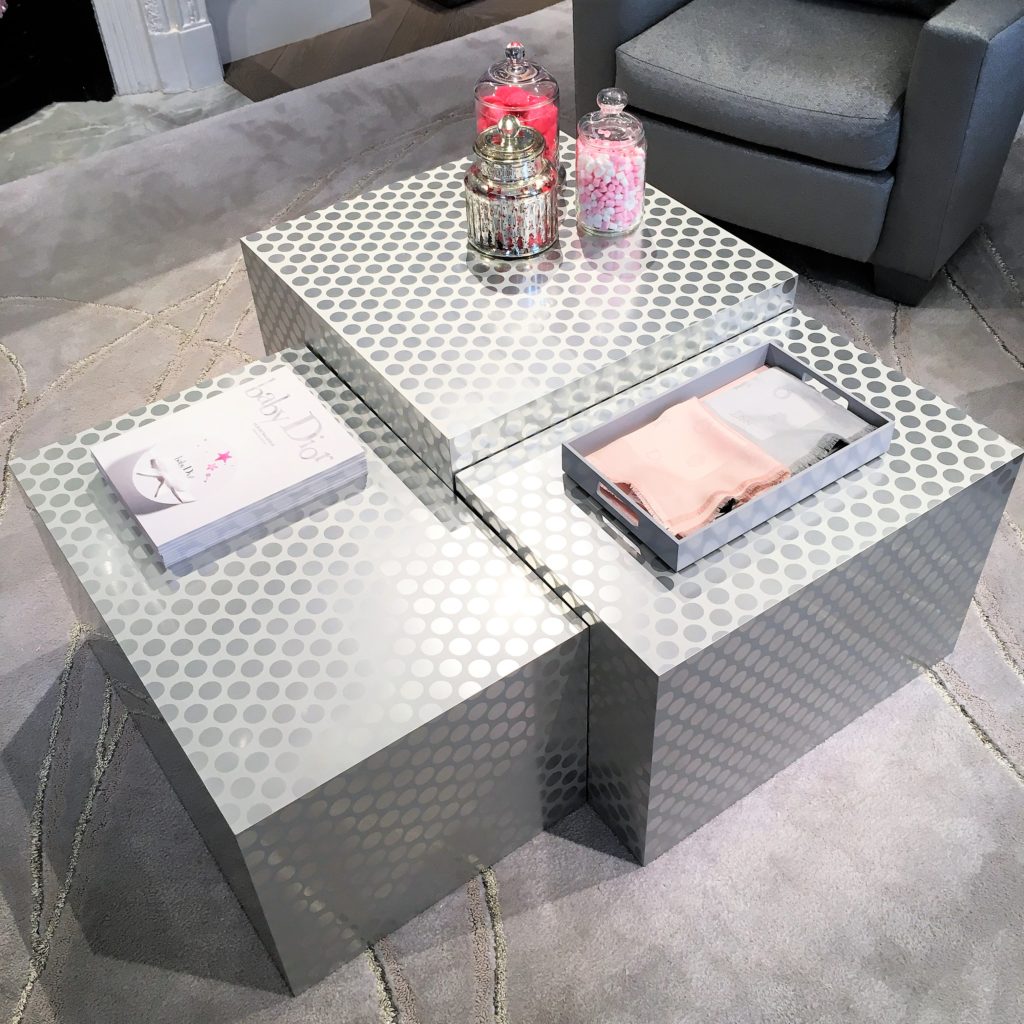 A stylish and contemporary coffee table at Dior's flagship store on Bond Street in London. The eye-catching silver polka-dots make a fabulous statement amongst the neutral grey tones. For more gorgeous coffee tables, click the link...